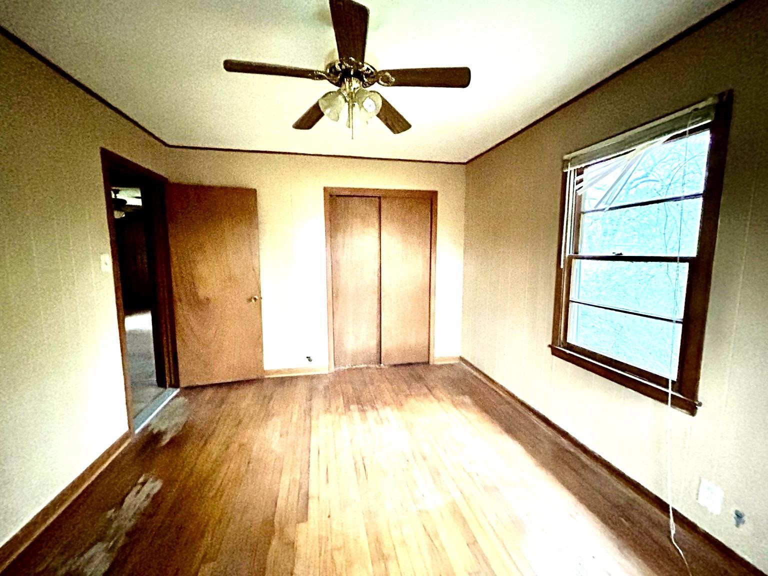 9122 Tulane Road Orange, TX 77630 - Photo 9 of 17 a view of an empty room and window