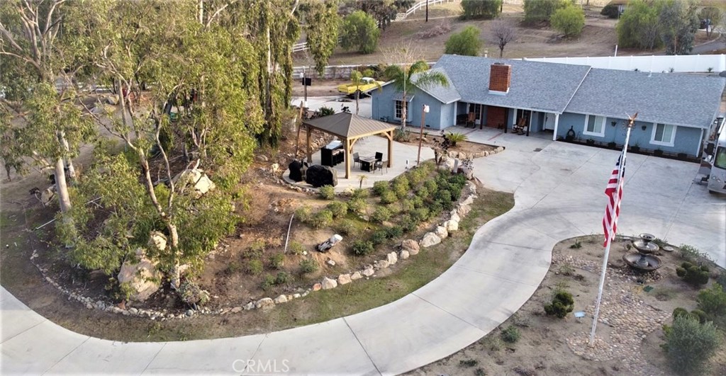 18907 Crop Road Riverside, CA 92504 - Photo 1 of 1 a view of a house with a yard