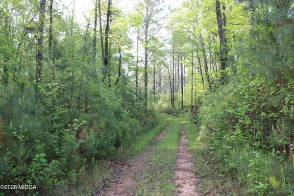 a picture of a bathroom with a sink and a mirror
