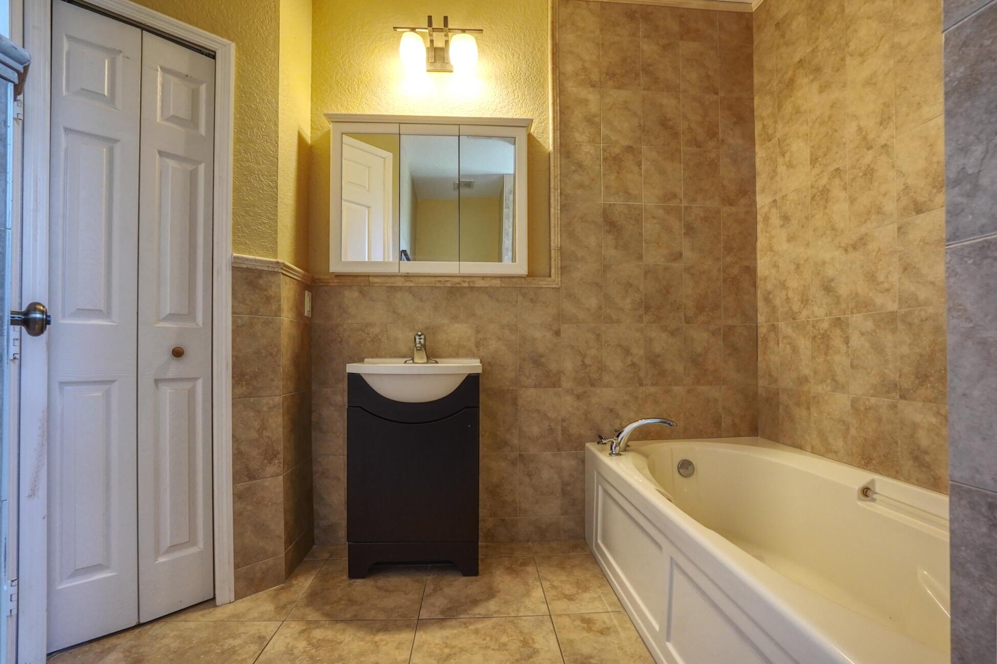 1550 C Road Loxahatchee Groves, FL 33470 - Photo 8 of 23 1550 c Rd bathroom pic