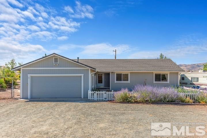5155 Pasture View Road Reno, NV 89510 - Photo 1 of 21 front view of a house with potted plants