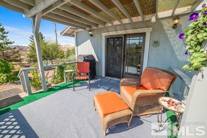 5155 Pasture View Road Reno, NV 89510 - Photo 18 of 21 a backyard of a house with outdoor seating