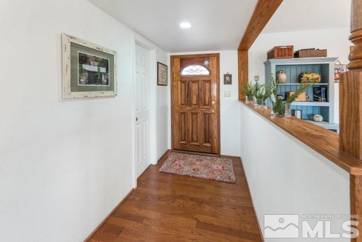 5155 Pasture View Road Reno, NV 89510 - Photo 2 of 21 a view of hallway with a large mirror