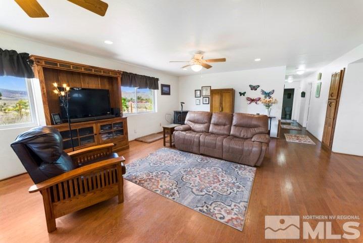 5155 Pasture View Road Reno, NV 89510 - Photo 3 of 21 a living room with furniture and a flat screen tv