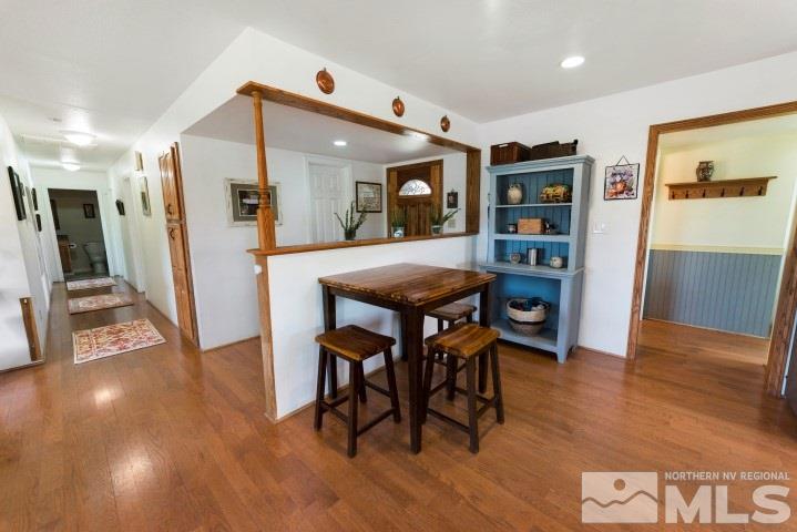 5155 Pasture View Road Reno, NV 89510 - Photo 6 of 21 a view of a dining room with furniture and wooden floor