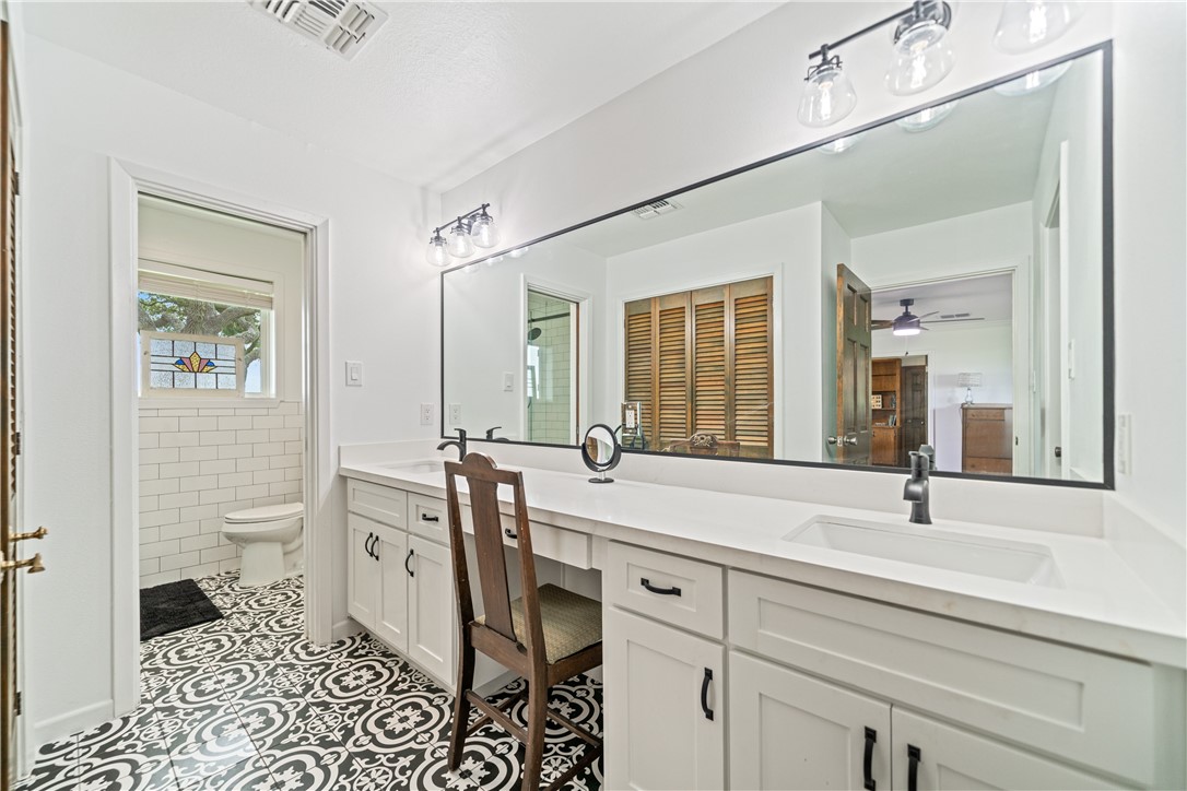 501 South County Road 1140 Riviera, TX 78379 - Photo 20 of 40 Updated primary bathroom featuring a dual-sink van