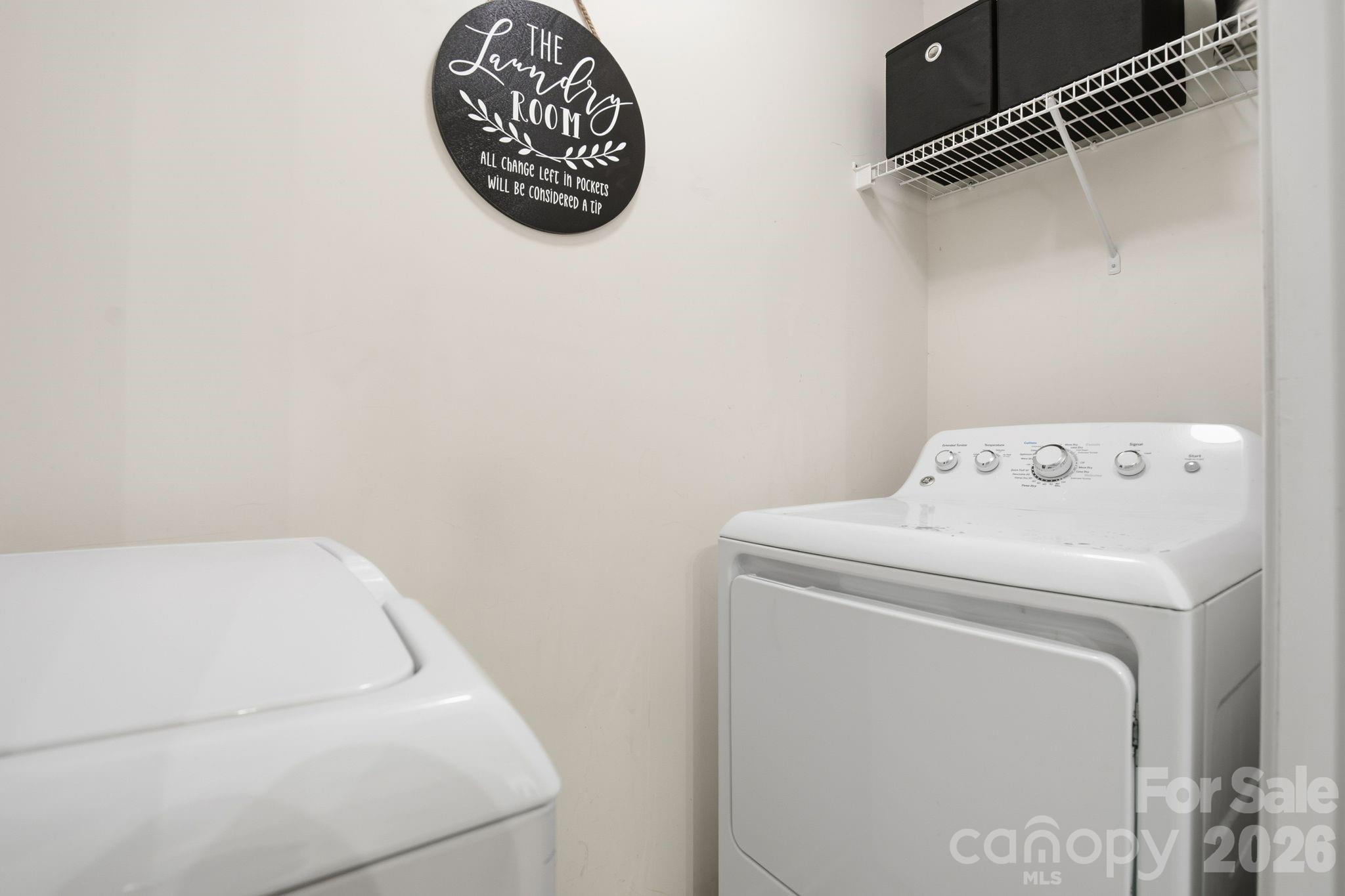 8376 Rudolph Road Charlotte, NC 28216 - Photo 15 of 28 a utility room with dryer and washer