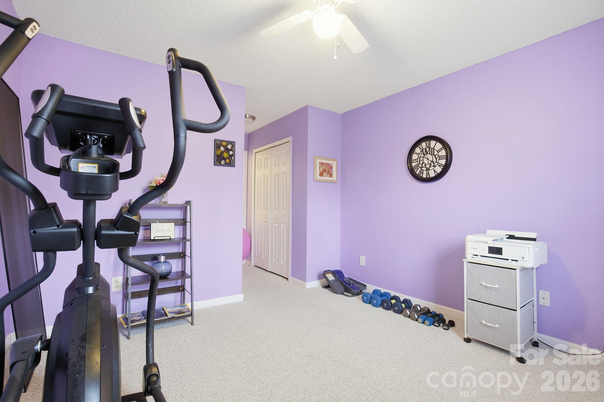 8376 Rudolph Road Charlotte, NC 28216 - Photo 24 of 28 a front view of a room with gym equipment
