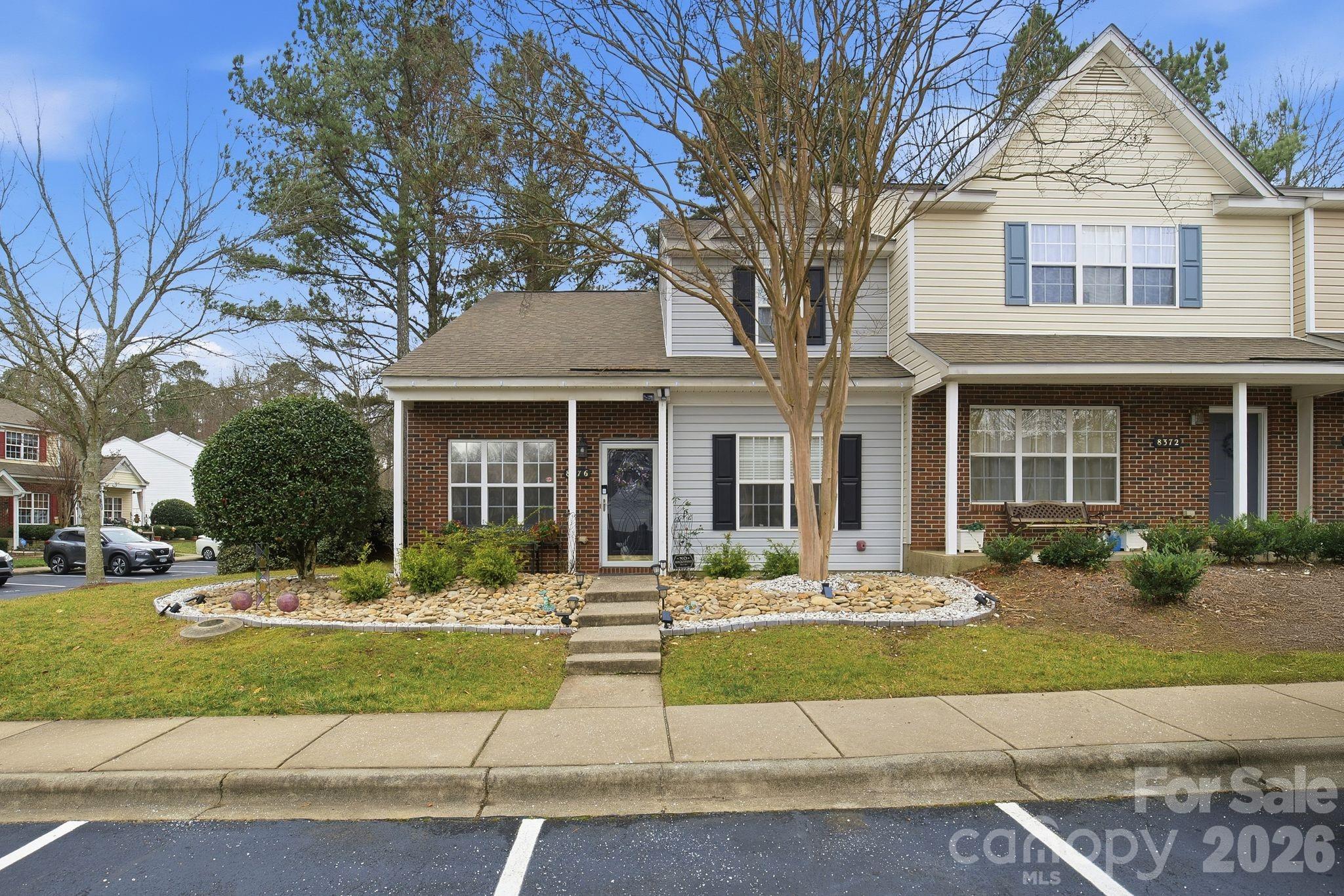 8376 Rudolph Road Charlotte, NC 28216 - Photo 4 of 28 front view of a house with a yard