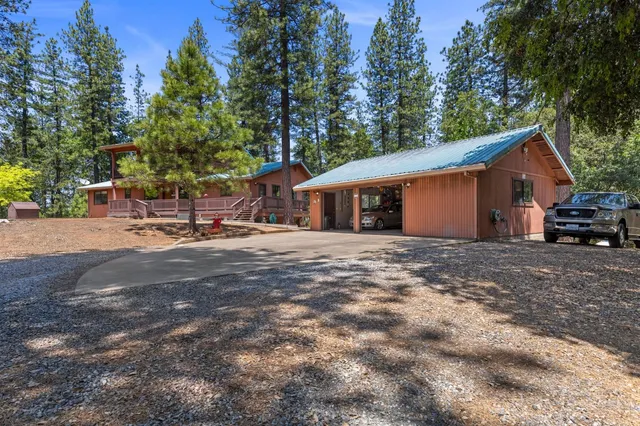 a view of front door with wooden floor and stairs