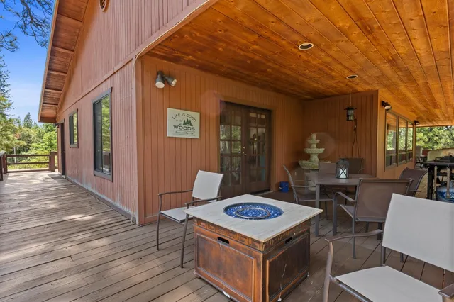 a bathroom with a toilet a sink a vanity and mirror