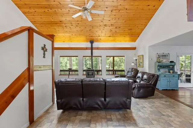 a bedroom with a bed and a furniture