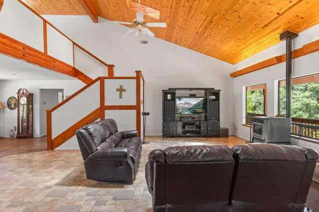 a bed room with furniture and a table