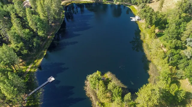 a view of a two chairs in the balcony