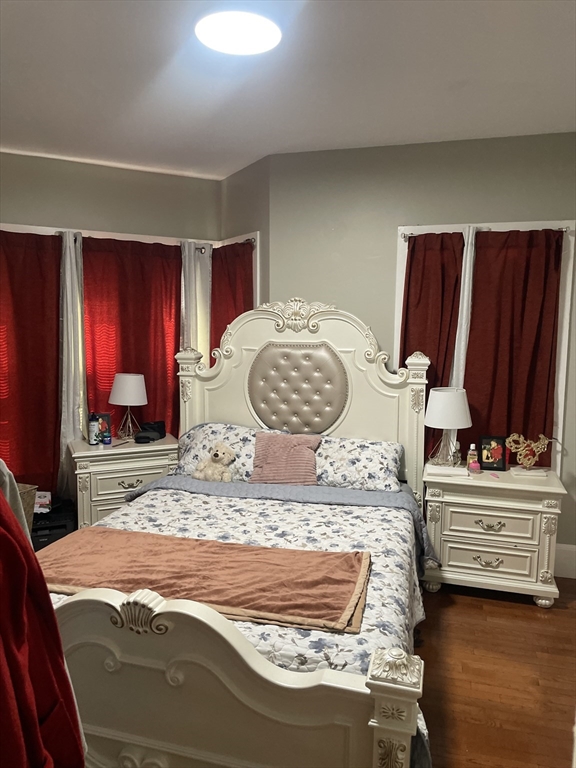 58 Brett Street, Unit 1 Brockton, MA 02301 - Photo 7 of 7 a bedroom with a bed and window