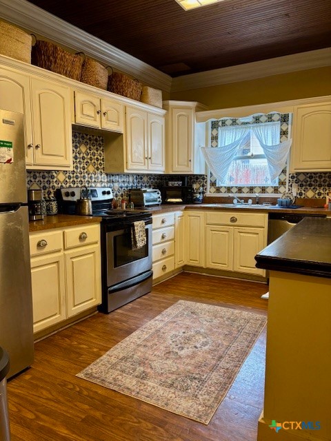 1408 Bridge Street Gatesville, TX 76528 - Photo 13 of 24 a kitchen with stainless steel appliances granite countertop a stove sink and cabinets
