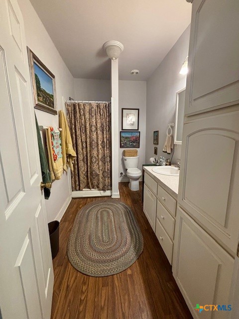 1408 Bridge Street Gatesville, TX 76528 - Photo 19 of 24 a kitchen with sink refrigerator and window