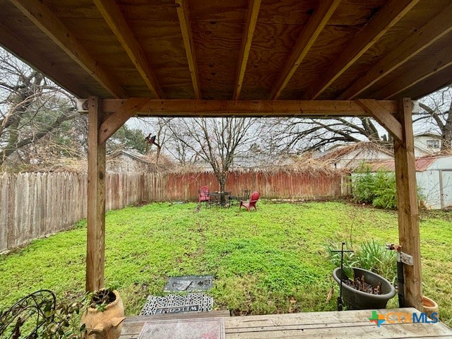 1408 Bridge Street Gatesville, TX 76528 - Photo 24 of 24 a backyard of a house with lots of green space