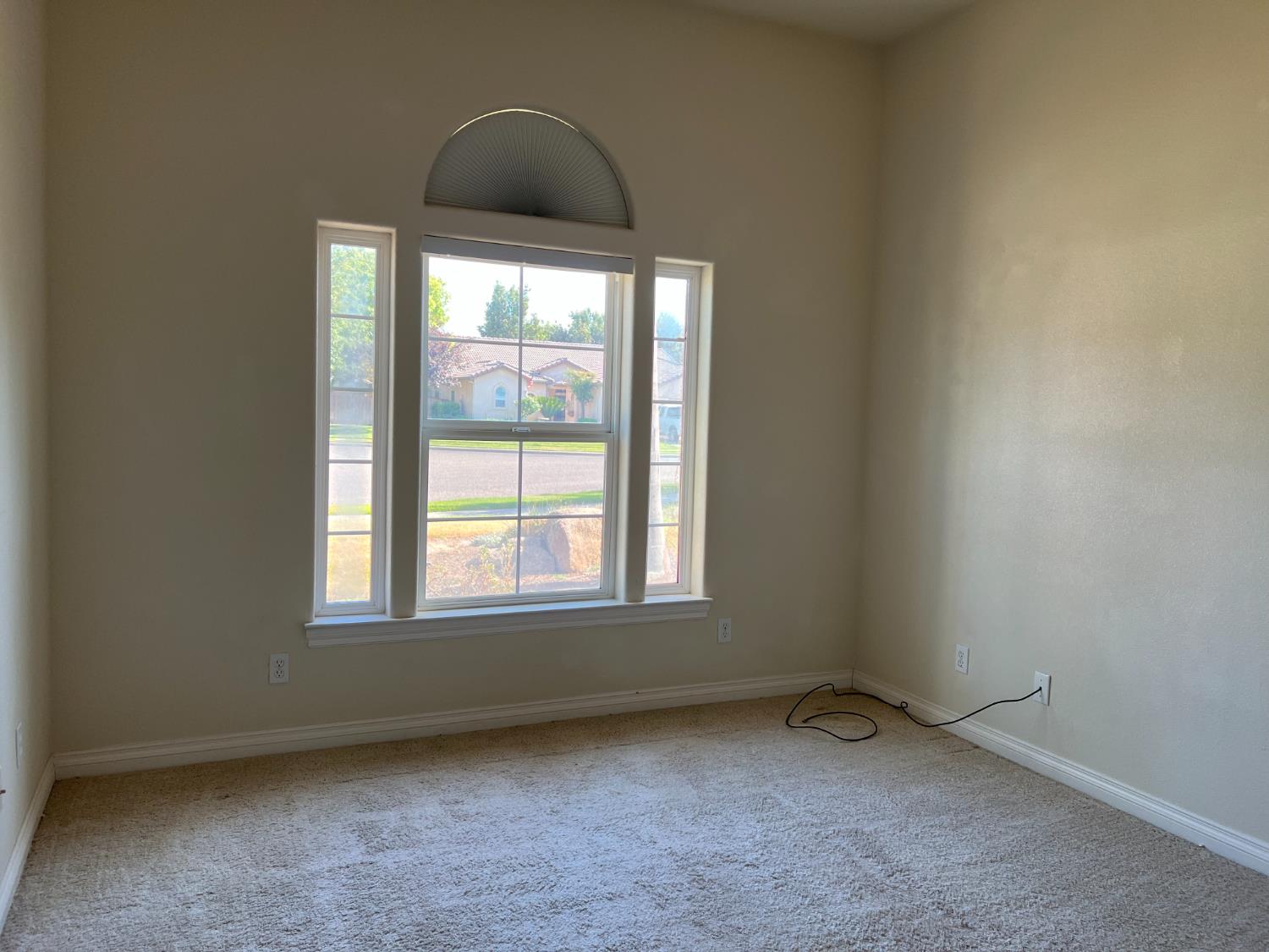 1046 Lords Court Lemoore, CA 93245 - Photo 14 of 23 an empty room with a window