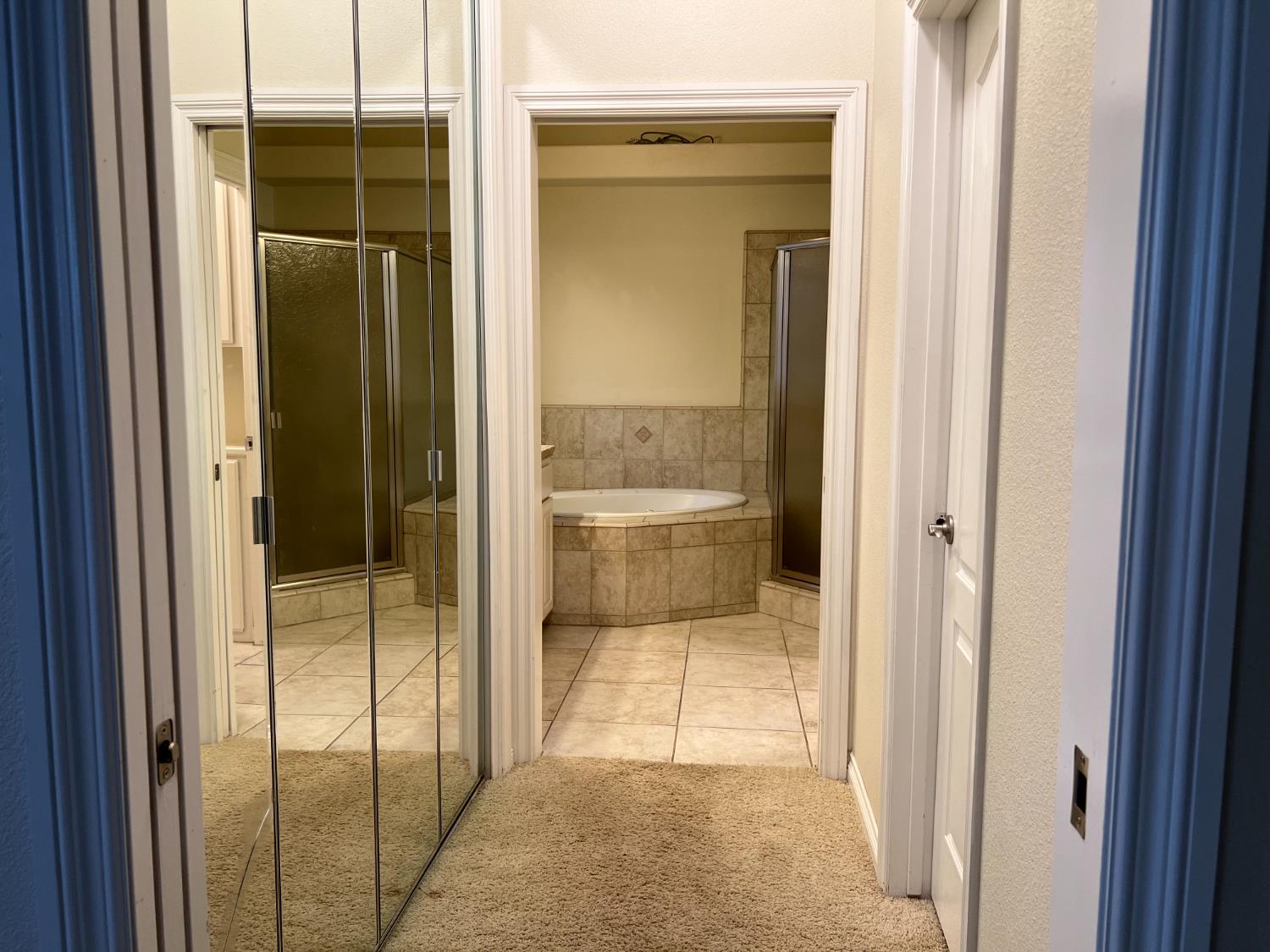 1046 Lords Court Lemoore, CA 93245 - Photo 17 of 23 a bathroom with a glass door shower and a sink
