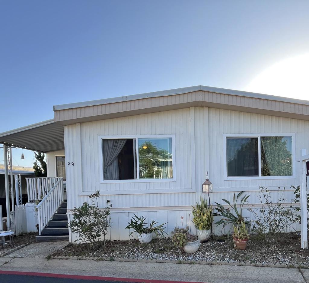 1810 Hillsdale Road, Unit 99 El Cajon, CA 92019 - Photo 15 of 15 a front view of a house with garden