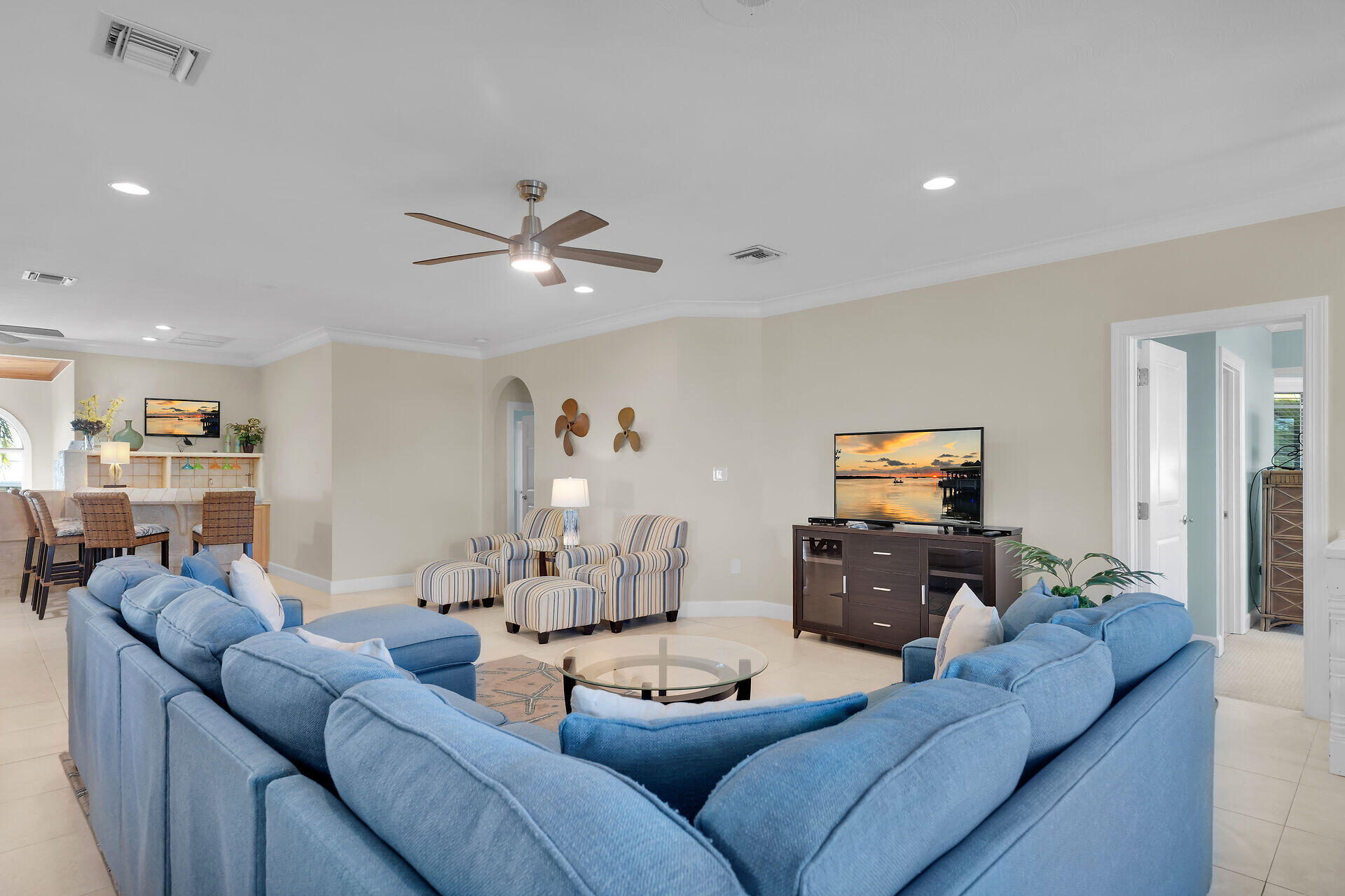 580-590 10th Street Key Colony Beach, FL 33051 - Photo 24 of 75 a living room with furniture and a flat screen tv