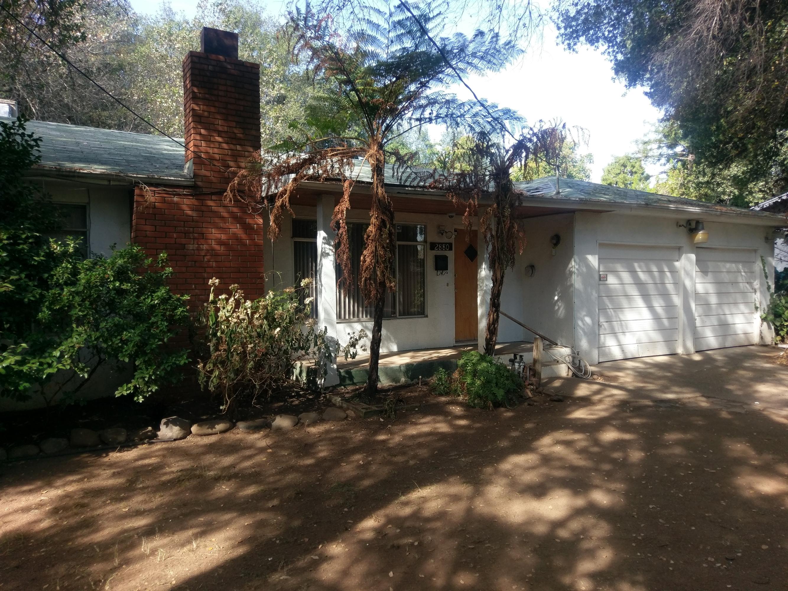 2880 Irwin Road Redding, CA 96002 - Photo 1 of 1 a view of a house with a tree