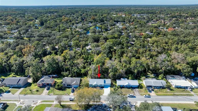 a view of yard with outdoor seating