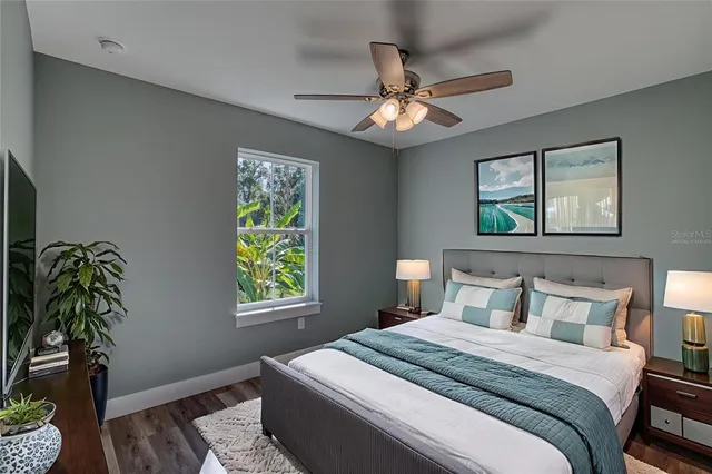 a view of an empty room with a white walls