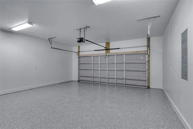 a house that has a tree in front of it