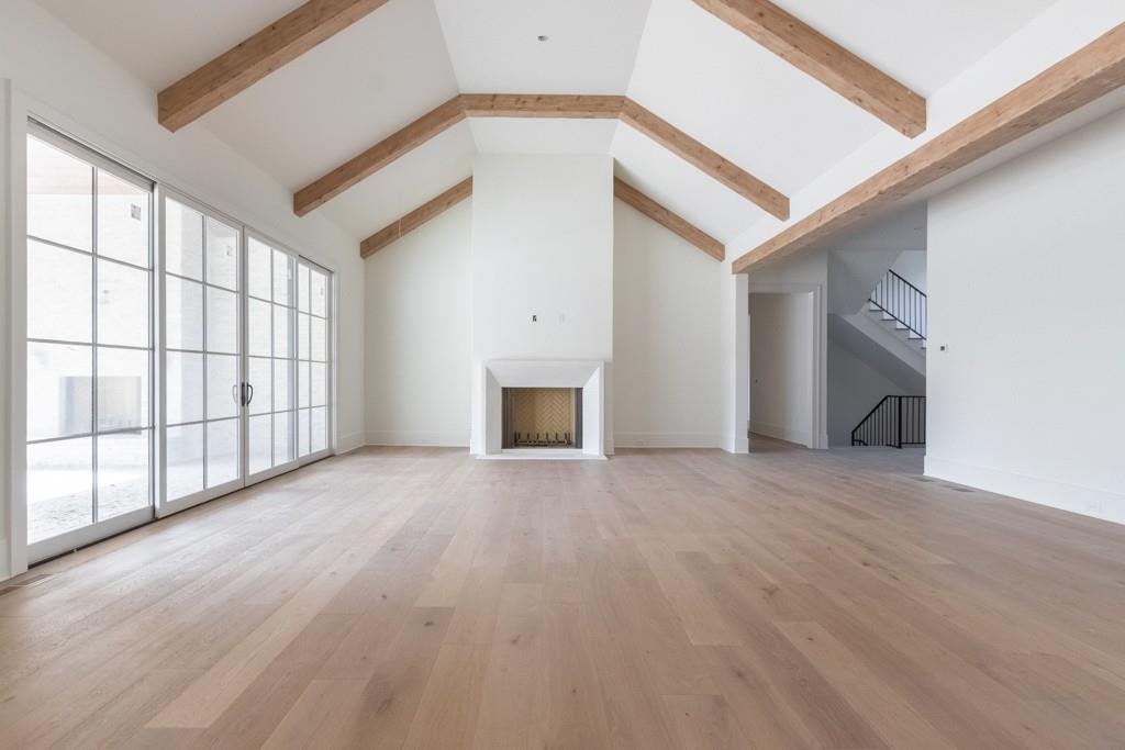 615 Hickory Flat Road Milton, GA 30004 - Photo 15 of 64 a view of an empty room with a fireplace and a window