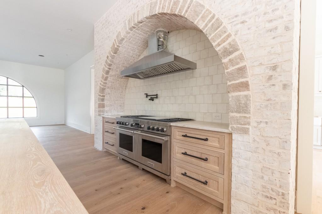 615 Hickory Flat Road Milton, GA 30004 - Photo 24 of 64 an empty room with a fireplace and windows