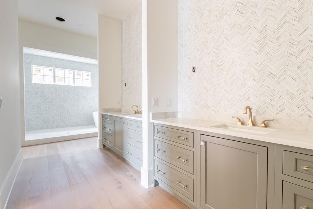 615 Hickory Flat Road Milton, GA 30004 - Photo 37 of 64 a bathroom with a granite countertop sink mirror and double