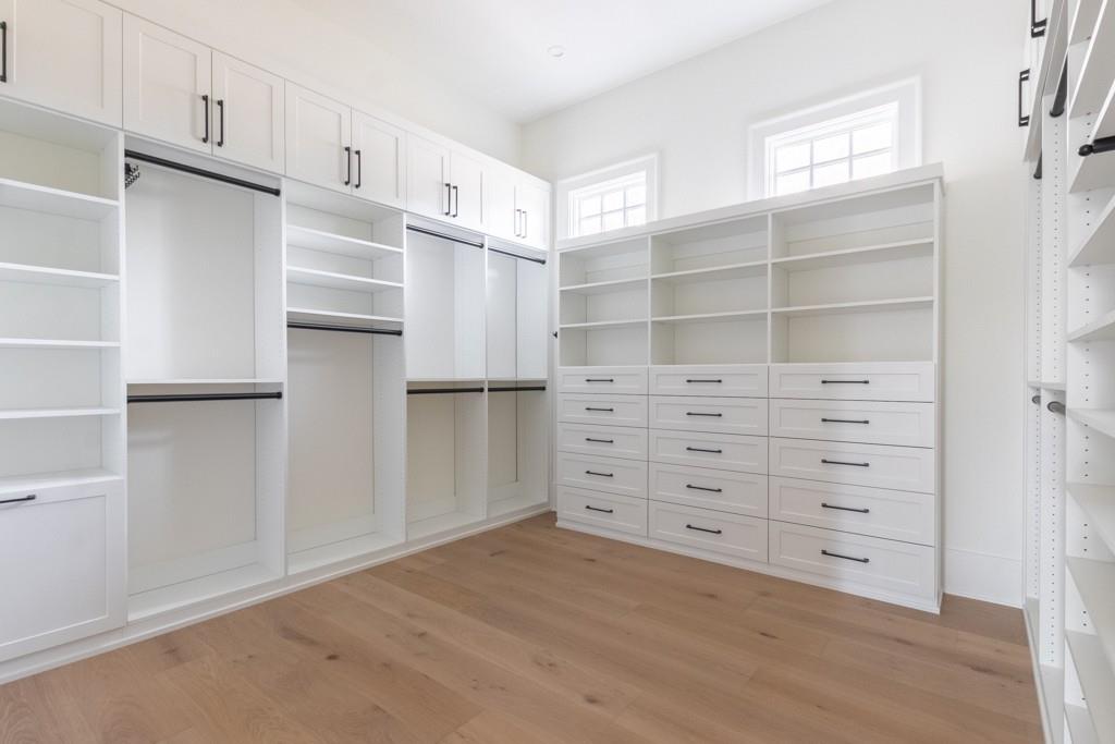 615 Hickory Flat Road Milton, GA 30004 - Photo 41 of 64 a view of walk in closet with cabinet