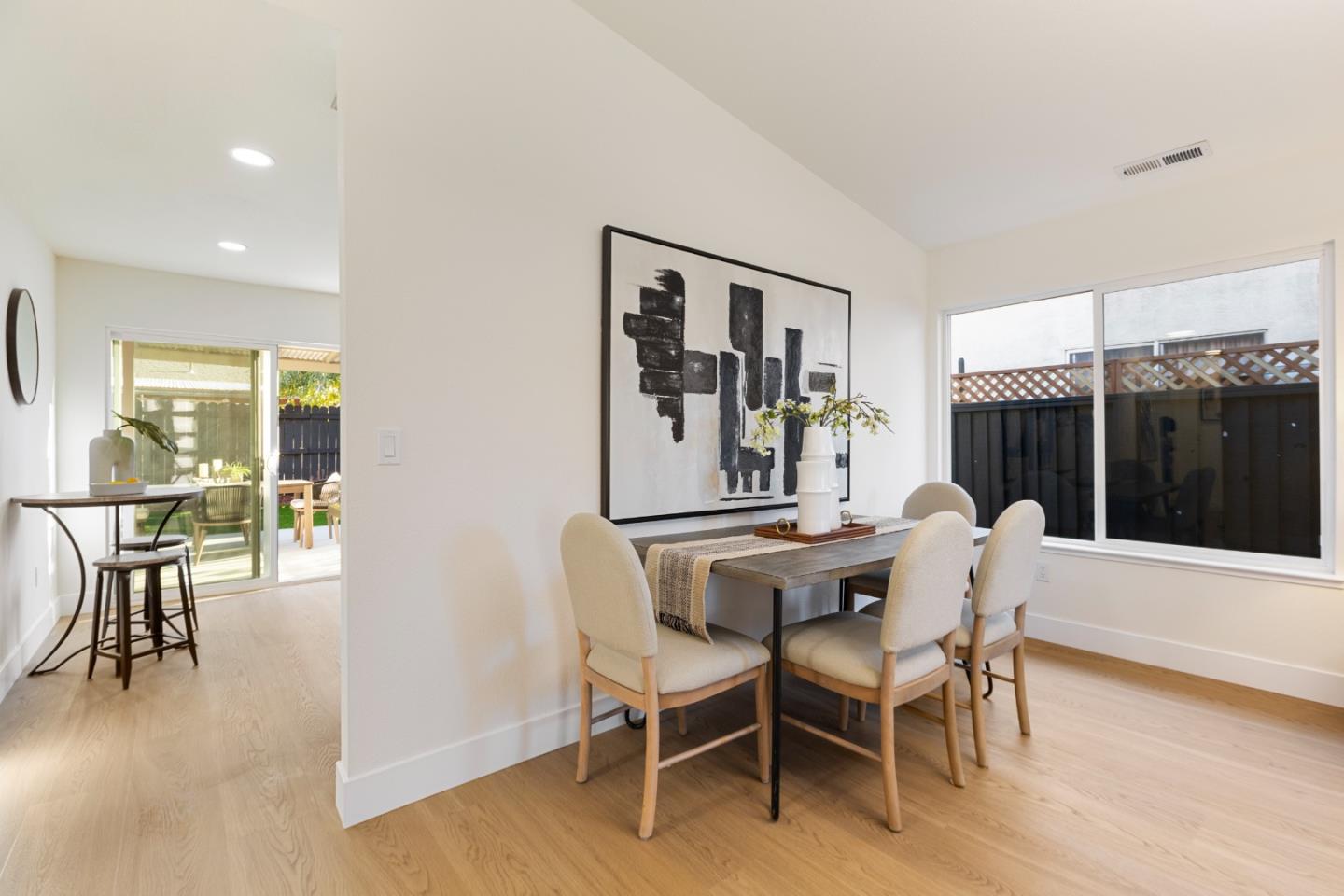 262 Checkers Drive San Jose, CA 95116 - Photo 4 of 17 a dining room with furniture and window