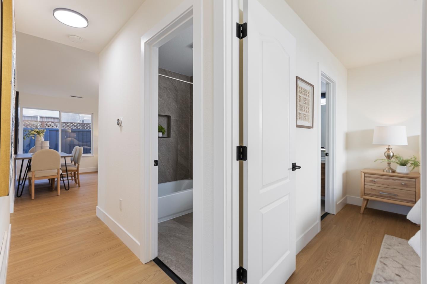262 Checkers Drive San Jose, CA 95116 - Photo 7 of 17 a view of a bedroom from a hallway