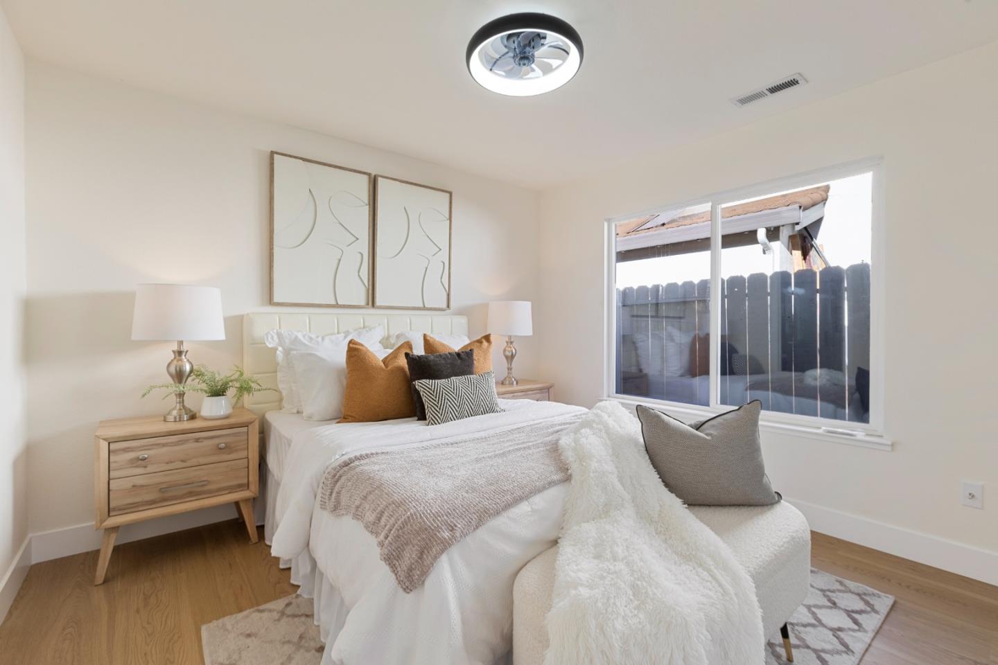 262 Checkers Drive San Jose, CA 95116 - Photo 8 of 17 a bedroom with a bed and a window