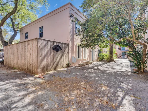 a view of a pathway with a house