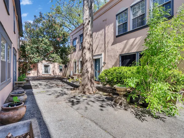 a view of a porch with furniture and a deck