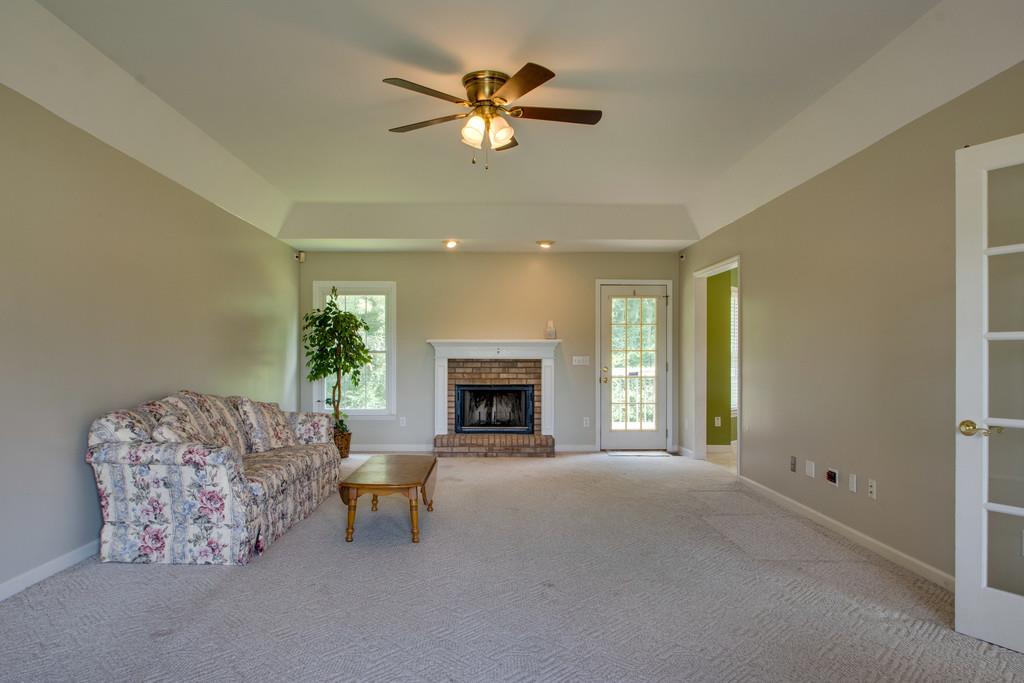 7342 Taylor Road Fairview, TN 37062 - Photo 3 of 17 25x15 Great Room with fireplace and ceiling fan