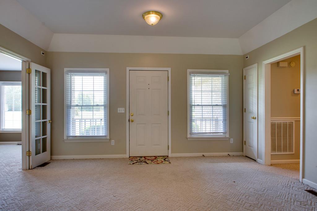 7342 Taylor Road Fairview, TN 37062 - Photo 9 of 17 Dining room (or office) is to the right of the front door and bedrooms are down the hall to the left.