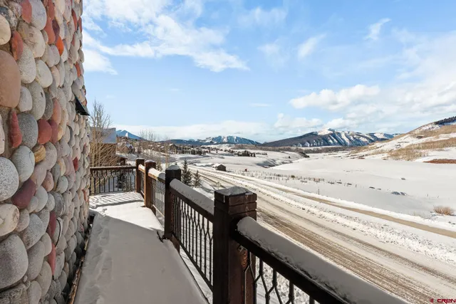 a view of a balcony with an outdoor space