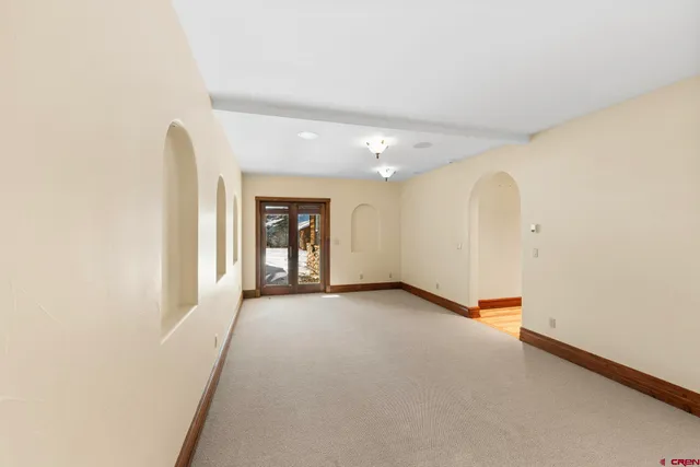 an empty room with a natural light