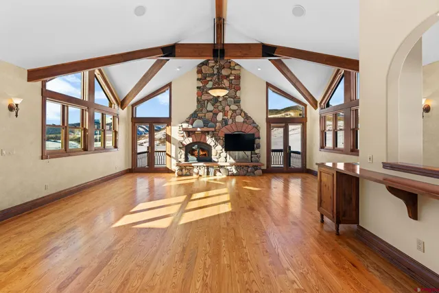 a view of a living room and chandelier