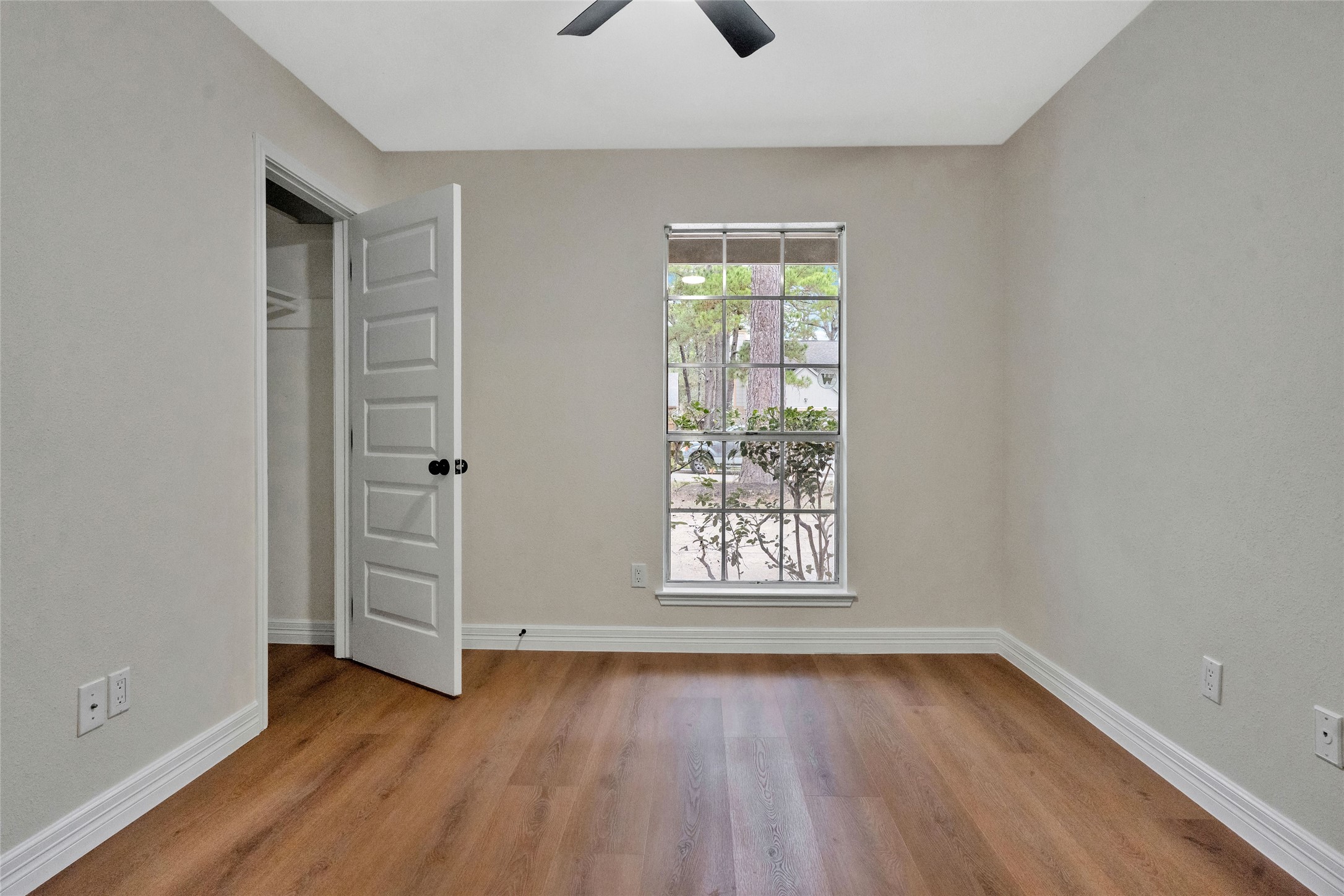 3 Still Corner Place Spring, TX 77381 - Photo 25 of 41 Versatile secondary bedroom conveniently located near the primary suite, offering a quiet setup well-suited for a home office or study.
