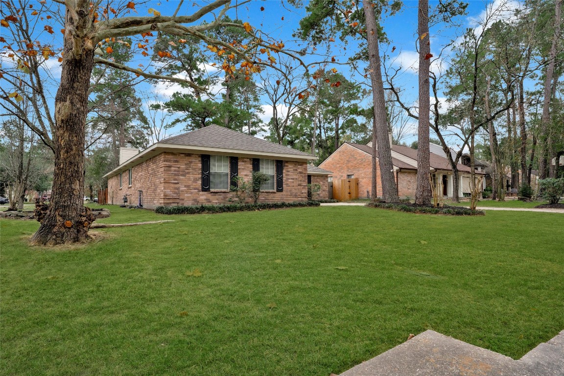 3 Still Corner Place Spring, TX 77381 - Photo 39 of 42 Situated on a spacious corner lot, offering added yard space, mature trees, and a sense of privacy with neighboring homes set back.