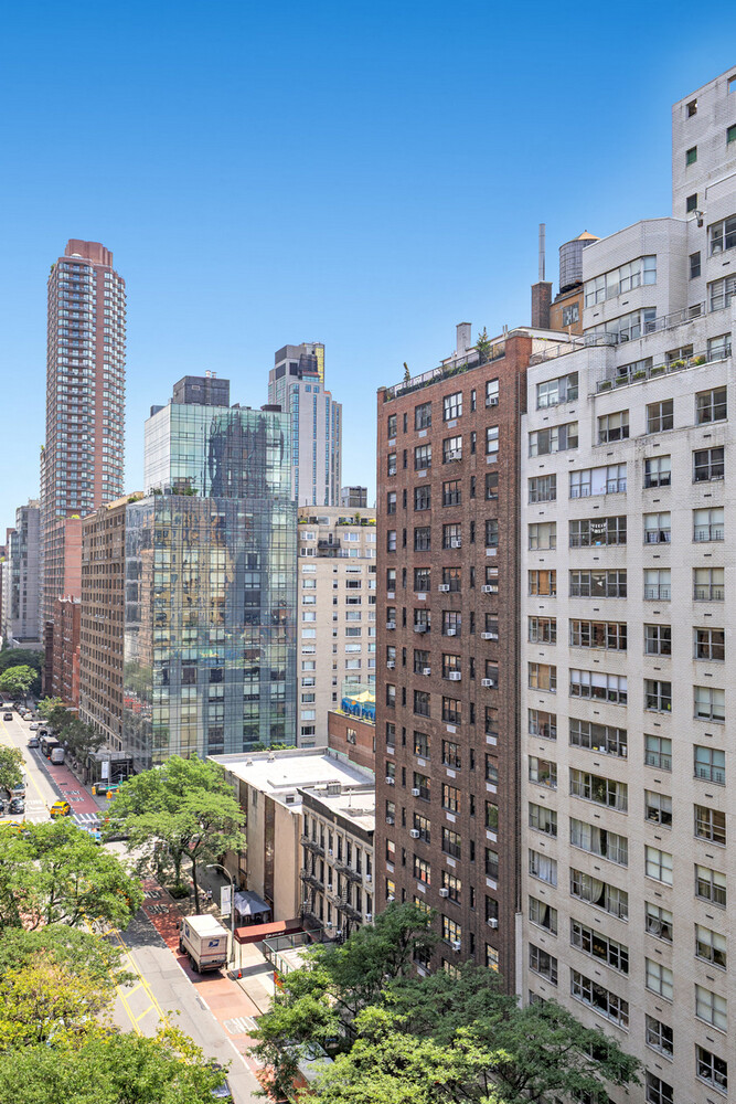 215 East 79th Street, Unit 12B Manhattan, NY 10075 - Photo 10 of 11 a view of a city with tall buildings