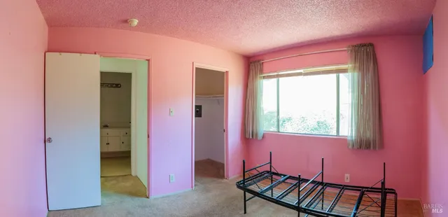 a view of a livingroom with furniture