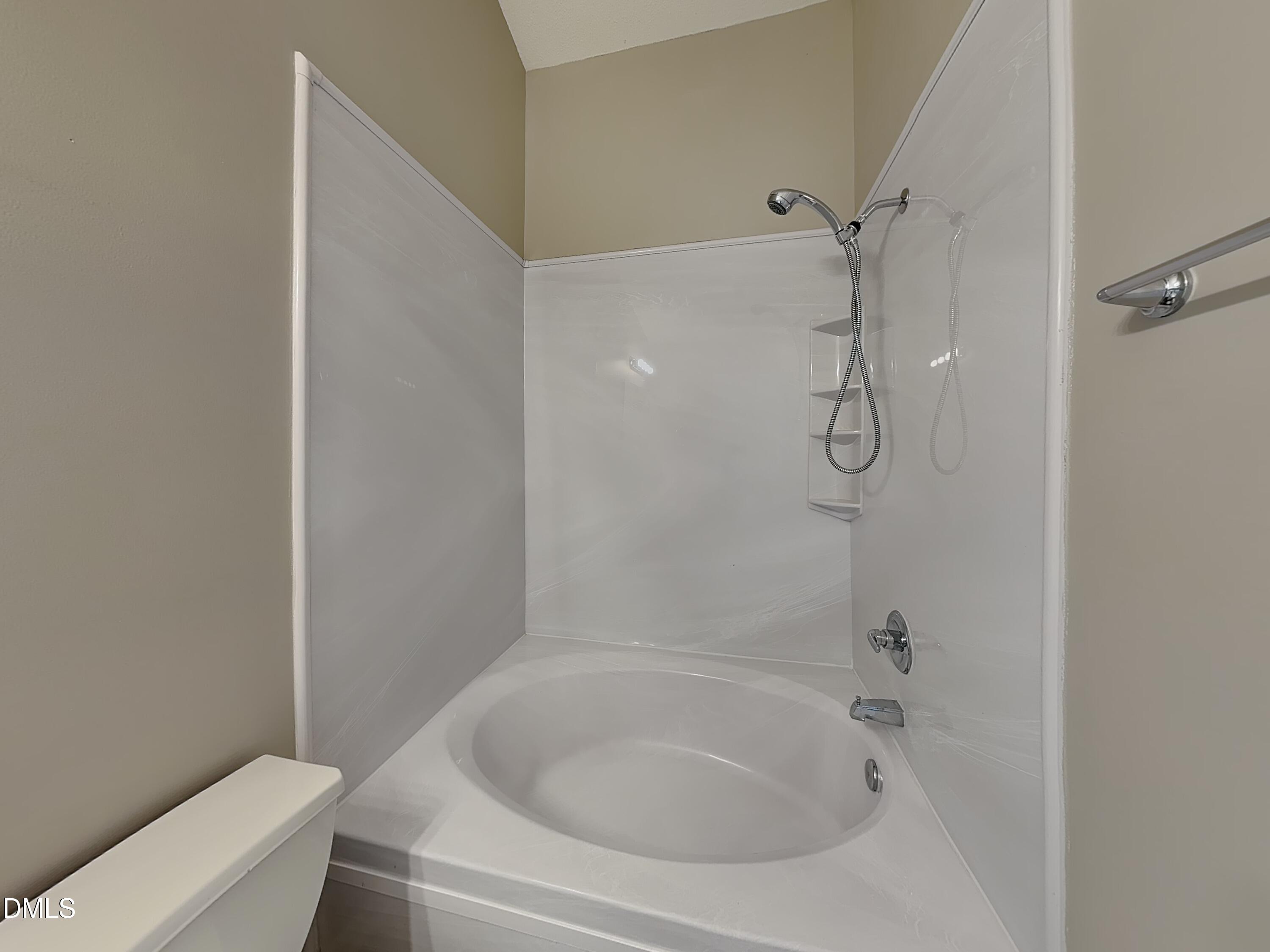 1716 Beacon Valley Drive Raleigh, NC 27604 - Photo 9 of 15 a bathroom with a tub and a shower
