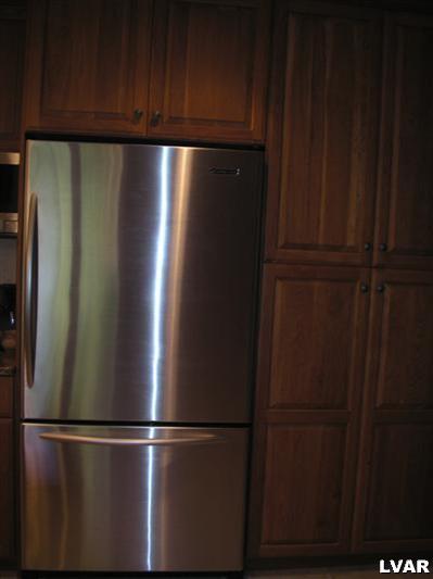 4075 Kozy Korner Road Center Valley, PA 18034 - Photo 10 of 27 Kitchenaid stainless refrigerator freezer with pull-out drawer.